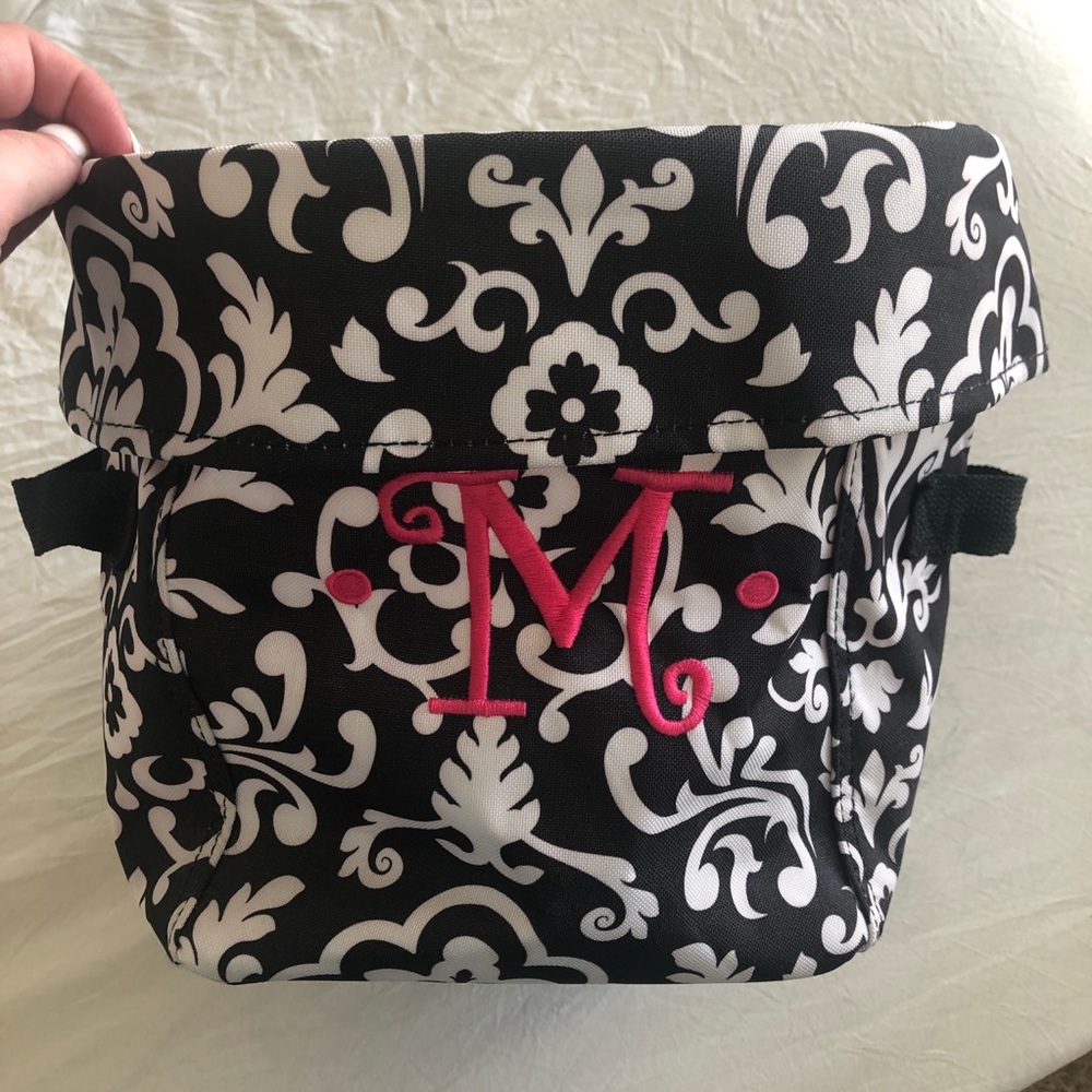 Thirty-one collapsible bucket bag with handles. M monogram on front